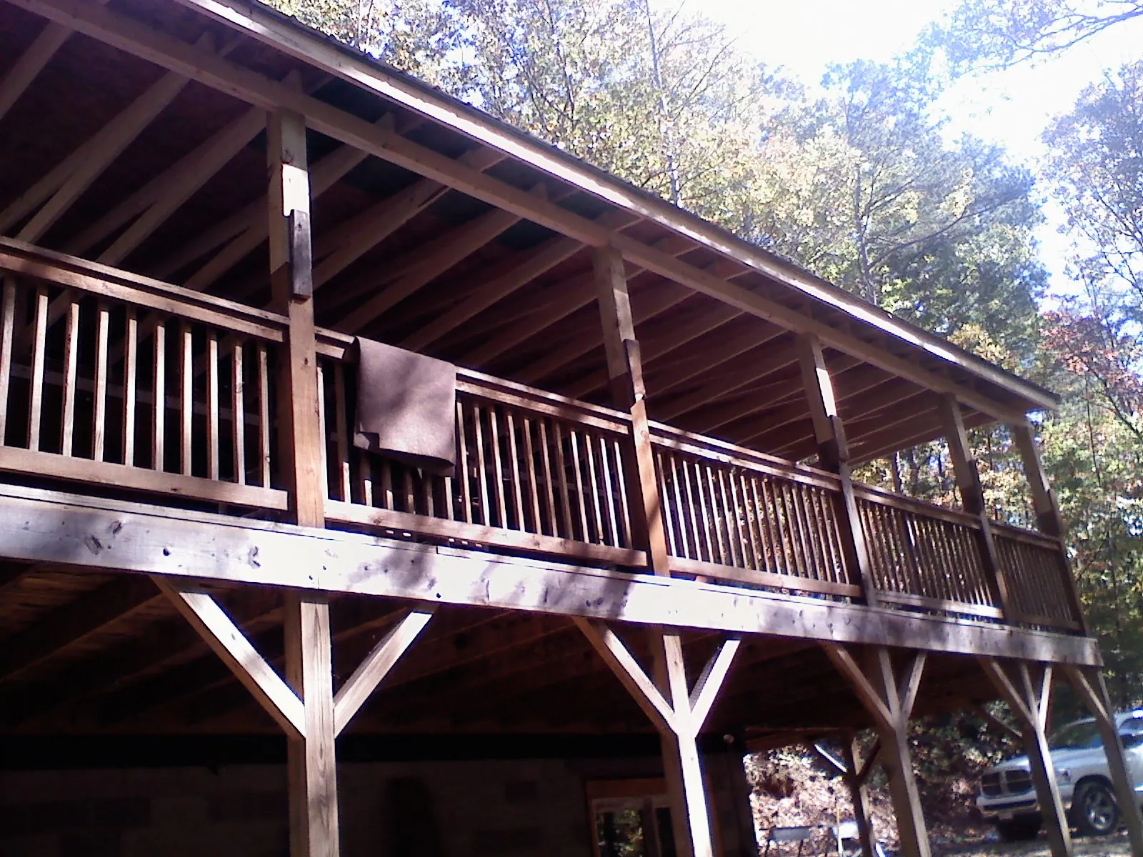 Timber framing under a new elevated porch and deck — Roof Leak Repair in Dallas by Roofing Brothers